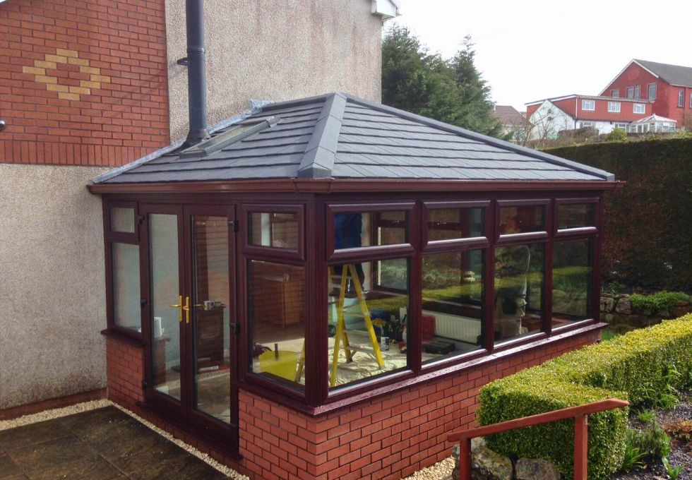 Modern tiled conservatory roof Swansea home stylish and durable