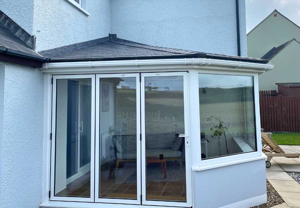 Swansea homeowner warm conservatory winter energy-efficient roof